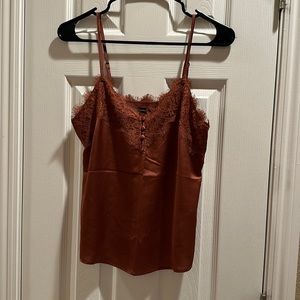 Burnt orange camisole top with lace trim silk like fabric